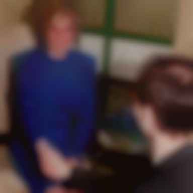 Diana shakes hands with an unidentified AIDS patient on April 19, 1987
